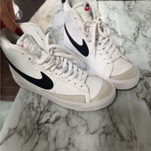 Nike White High-Top Sneakers with Black Swoosh and Light Gray Accents